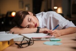 Overcome tiredness fatigue-women-asleep-at-work-desk